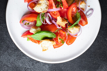 tomato vegetable salad panzanella veggie croutons, olive oil, rusk healthy food meal snack copy space food background  vegan vegetarian food