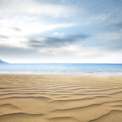 Fototapeta na wymiar Summer background of sand and sea landscape 