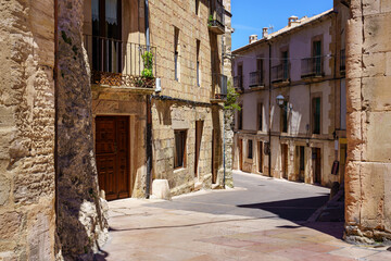Fototapeta na wymiar Narrow street of medieval old town in Castile Spain.