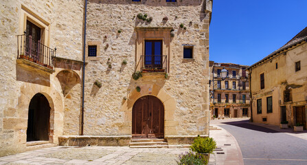 Old stone houses with arched doorways in the town of Castilla. Sepulveda.