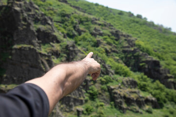 man finger show in nature