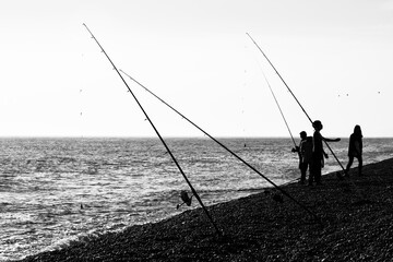 Black and White silhouette of fishing on the sea