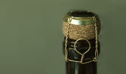 Italian Wine bottle neck with cork fastened with wire side view with copyspace