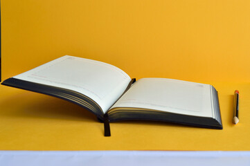 notebook and pencil