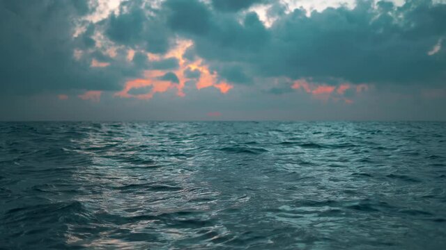 sunset over the deep sea