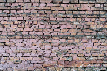 Dirty square brick wall abstract wallpaper background 