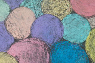 Colorful balloons painted on asphalt with chalk close