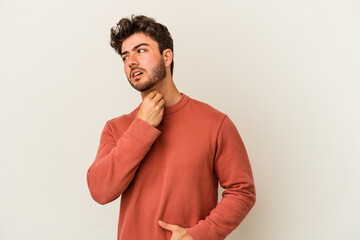 Young caucasian man isolated on white background suffers pain in throat due a virus or infection.