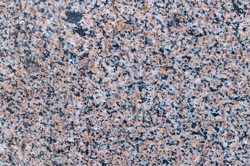 Natural texture of gray and red granite stone. Construction material	