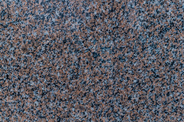 Natural texture of gray and red granite stone. Construction material