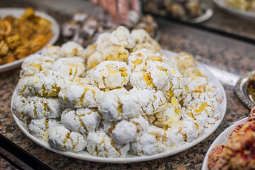 handful  of oriental sweets on the market in the old town in Marrakech
