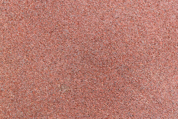 Empty red running track in stadium. Top view