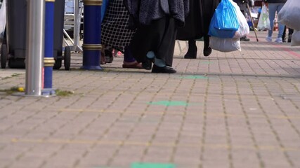 Shoppers walking in a market place
