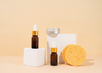 brown bottles mockup for natural skincare cosmetics, spa accessories on white podiums, cream background