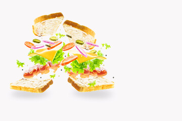 In the photo you see two sandwiches with different products - meat, herbs and fresh vegetables. Light background. Pastel shades. Levitation. Place for your lettering.