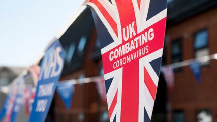 A Union Jack flag with Coronavirus message