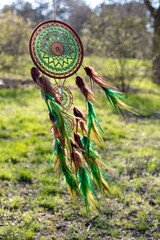 Handmade dream catcher with feathers threads and beads rope hanging