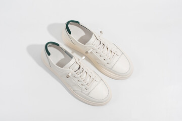 Women's white leather sneakers with thick soles