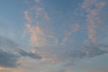 Naklejka na ściany i meble clouds float at sunset