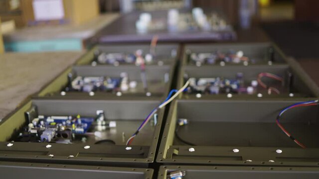 Slider shot of a metal components and microcircuits in workshop laboratory
