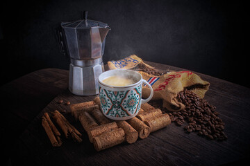 a cup of cappuccino coffe and italian moka