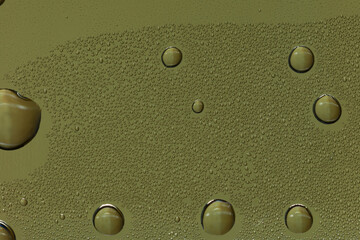 An abstract photo. Water drops on the sides of a plastic bottle.