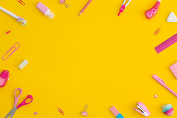 School stationery on a yellow background. Top view with copy space. Flat lay. Back to school concept.