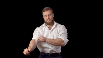 Caucasian Man in a shirt with a beard. Emotions. Man on a black background. High quality photo
