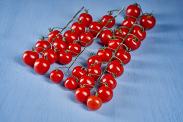 Cherry tomatoes on a wooden board
