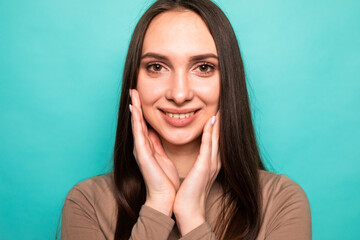 Portrait of nice cute cheery attractive sweet charming lady crossed arms ad advert advice isolated over turquoise background