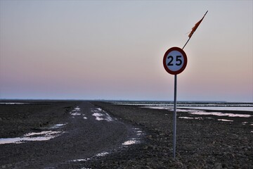 Wadden sea road from the mainland to the island Mandoe in Denmark. Can only be accessed at low...