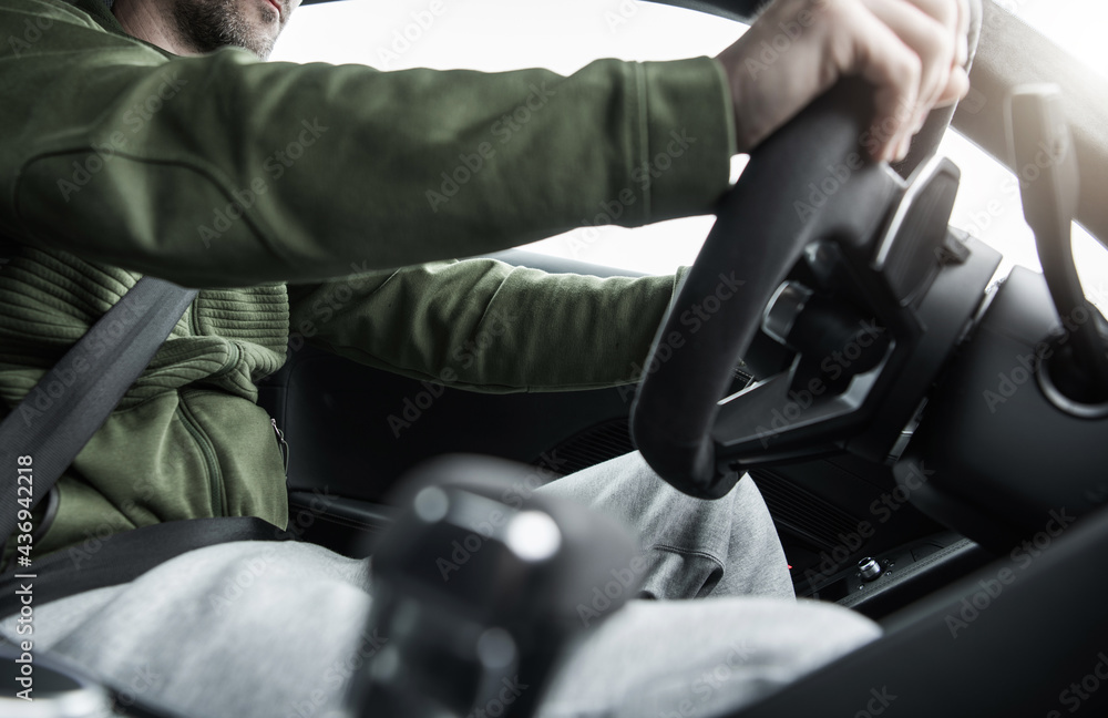 Canvas Prints caucasian men behind the car wheel