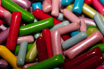 Multicolored jelly stick candies background