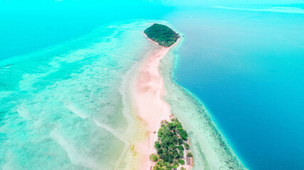 A small island with a sandbar to cross both islands in Sabah. Mataking Island, Sabah, Malaysia