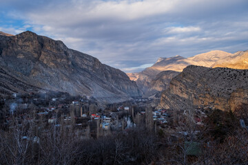Scenic view of Tortum Valley in Erzurum. Caglayan village between mountains. January 2021