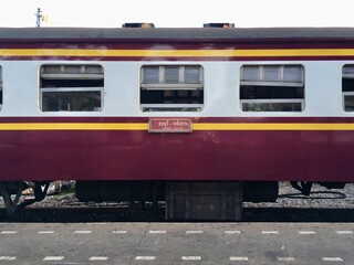 Train on station waiting for passenger, body side train, background