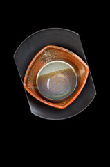 ceramic bowls stack against black