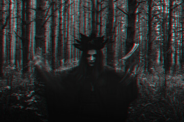 witch in a black costume performs dark spells with candles in the forest