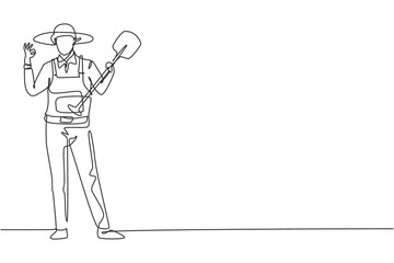 Continuous one line drawing male farmer stood with gesture okay, wearing straw hat and carrying shovel to plant crops on farmland. Success business. Single line draw design vector graphic illustration