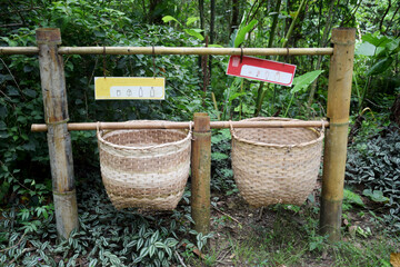 Bamboo basket for garbage in park