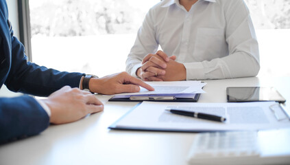 Business people signing contract making a deal with real estate agent Concept for consultant and home insurance concept.Real estate investment Property insurance and security.