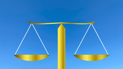 金色の天秤と青空