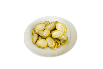 Pickled mangoes (Mangifera indica L. Var.) on the wooden bowl.