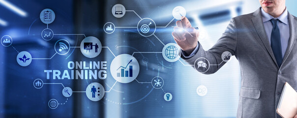 Online Training concept. Business Hand pressing OT inscription