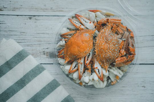 Steamed Lump Crab Meat In Disposable Plastic Container. Seafood Industry.