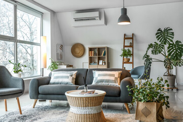 Interior of stylish living room with glowing lamps
