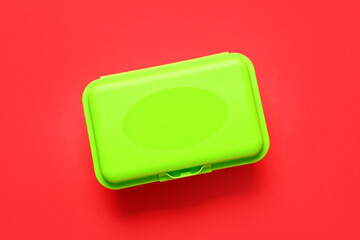 Plastic lunch box on color background