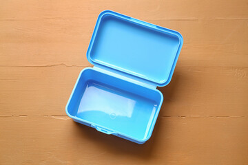 Plastic lunch box on color background