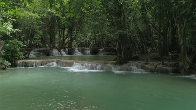 Crystal Clear Emerald Water at Erawan Waterfall Kanchanaburi Thailand