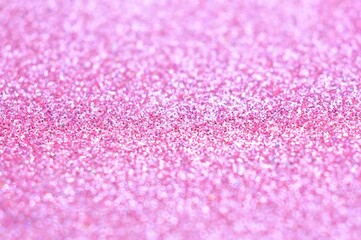 Abstract bokeh lights glittering pink colors blur background